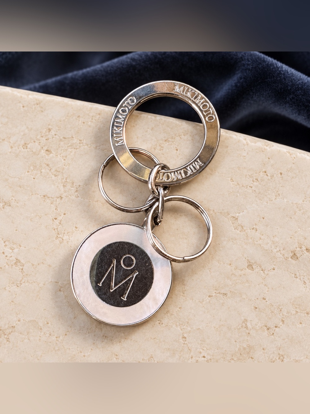 Mikimoto Mother of Pearl Silver Tone Medallion Key Holder Keychain